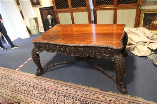 A 19th century Burmese hardwood centre or library table, W.5ft 10in. D.3ft 8in. H.2ft 6in.